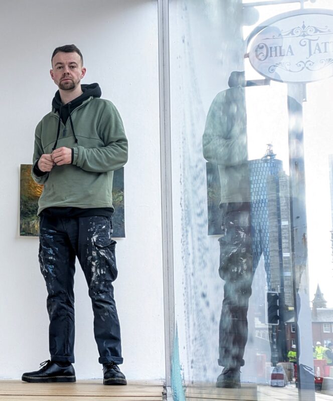 Joe with his art work